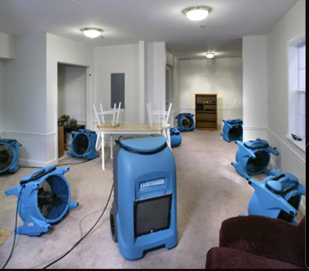 Air movers and dehumidifier setup for Water Damage Restoration in White House